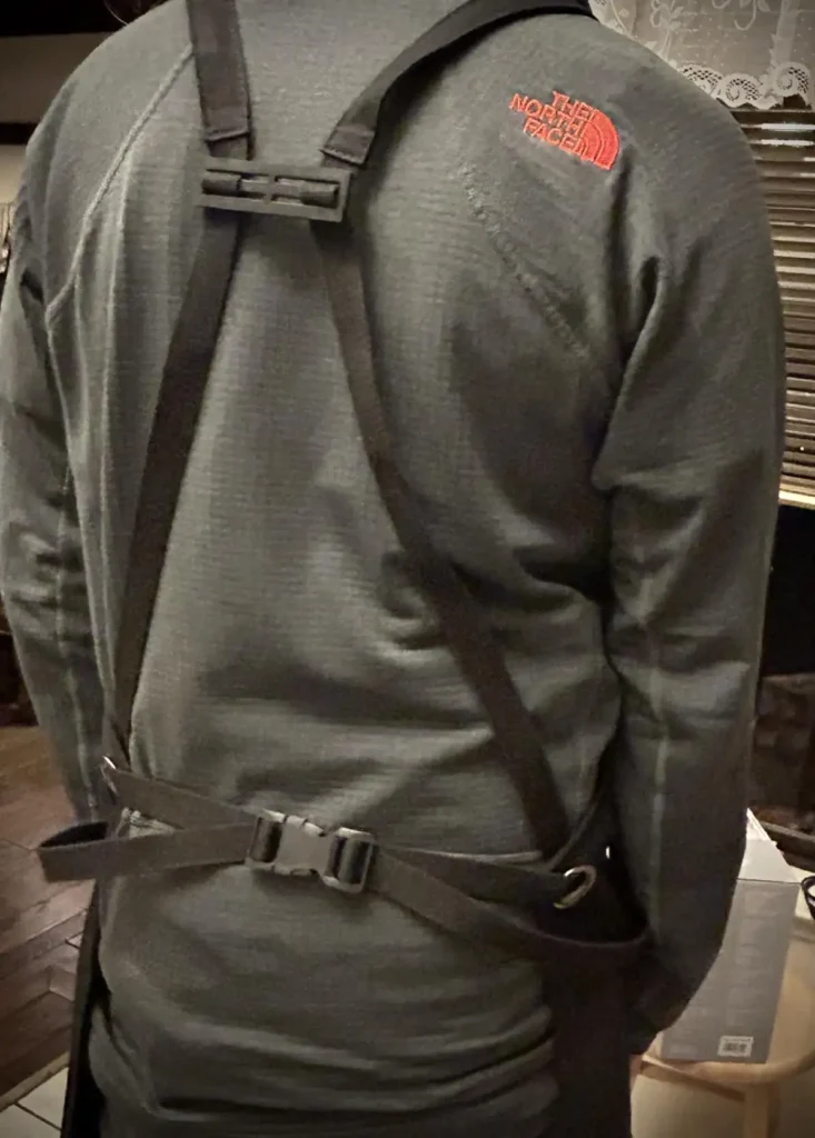 Woodworking apron shoulder strap detail, fixed with 3D prints.